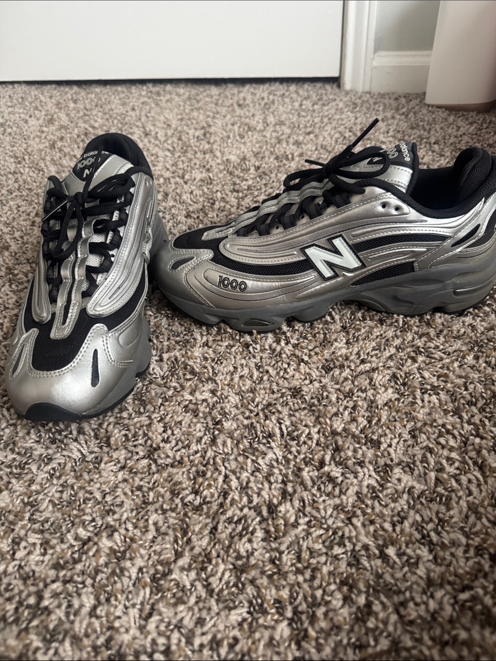 New Balance Silver and Black 1000 Runner Sneakers